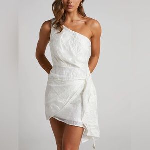 BRAILEY ONE SHOULDER WRAP FRONT MINI DRESS IN WHITE JACQUARD